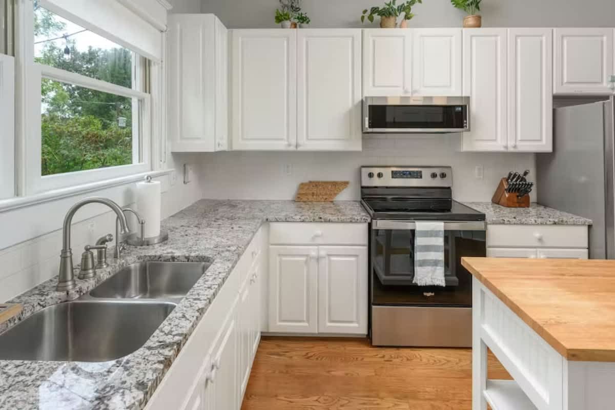 White kitchen with granite counters