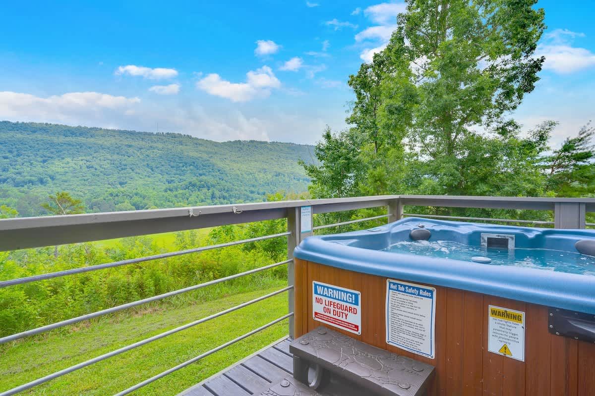 Hot tub on the deck facing the valley