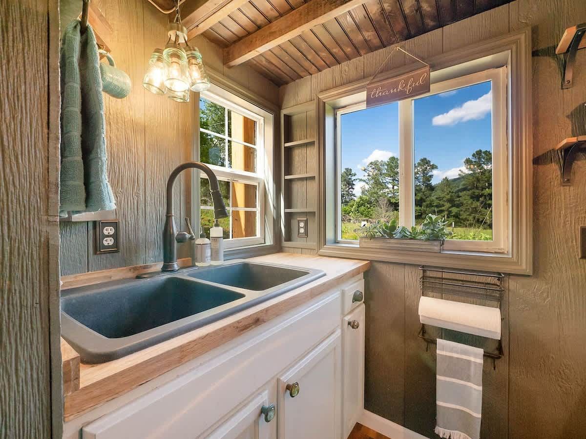 Kitchen with a farmhouse sink and wood counters