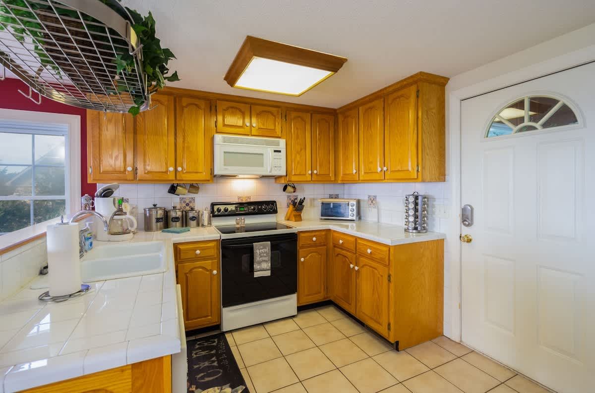Kitchen with wood cabinets