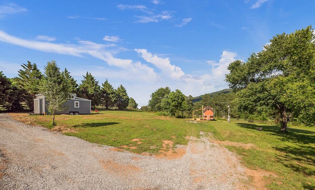 Gravel drive through the meadow
