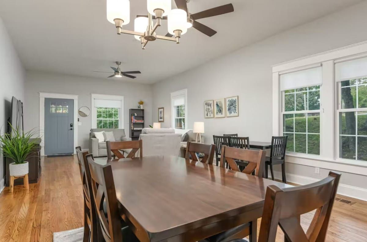Dining table for six under a chandelier