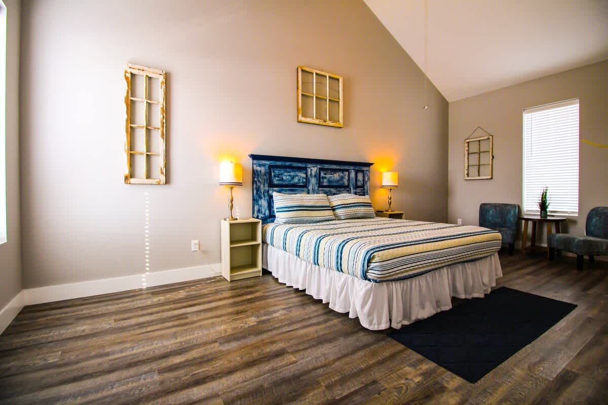 Third-floor bedroom with a vaulted ceiling