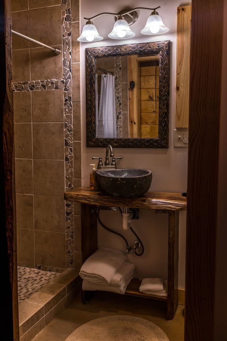 Stone vessel sink in the bathroom