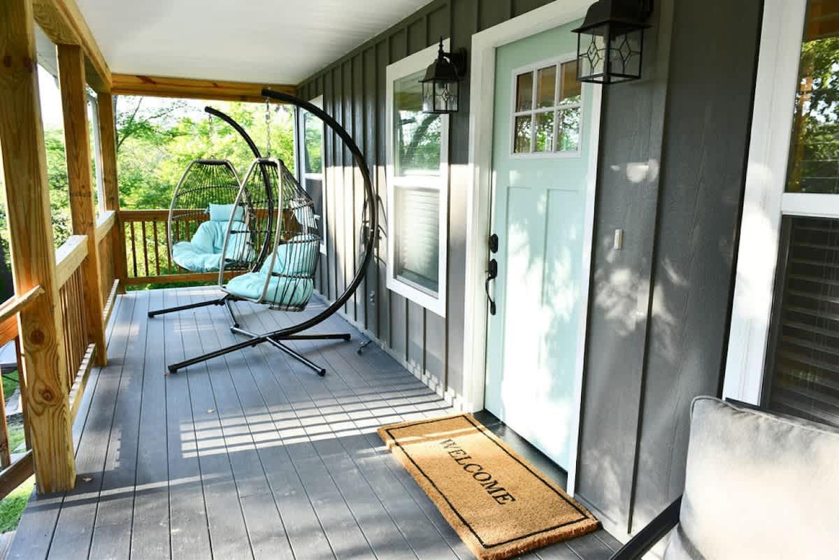 Hanging egg chair on the front porch